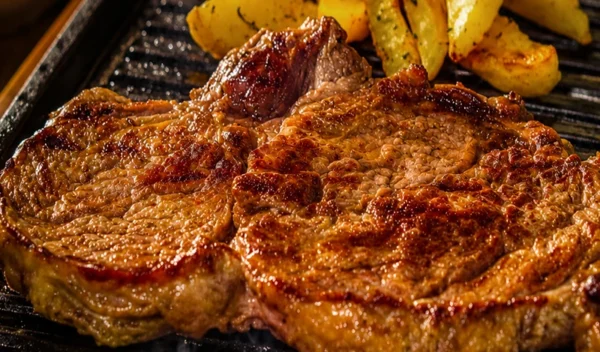 Grilled Chops with Roast Potatoes